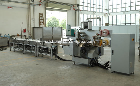 Automatische papierverpakkingsmachine voor het inpakken van chocoladebalken met een luchttoevoer van 0,6 MPa