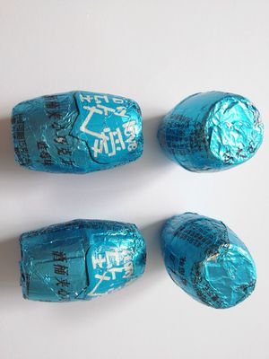 Motordreven verpakkingsmachine voor chocoladeballen voor het verpakken van snoep en koekjes